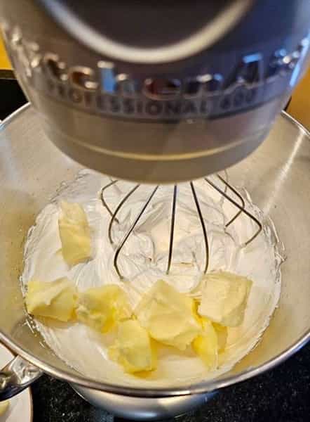 Adding butter to buttercream
