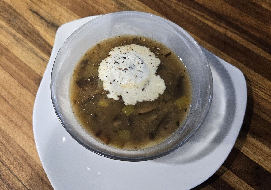 Soup with cream garnish