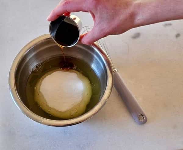 Pouring vanilla in