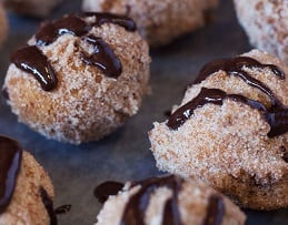 Pumpkin Donuts with Chocolate Sauce