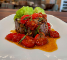 Pepper-Crusted Steaks with Tomato-Shallot Vinaigrette