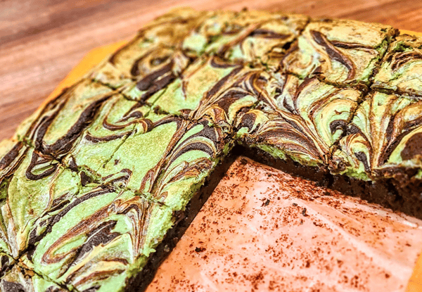 Matcha Cheesecake Brownies in pan